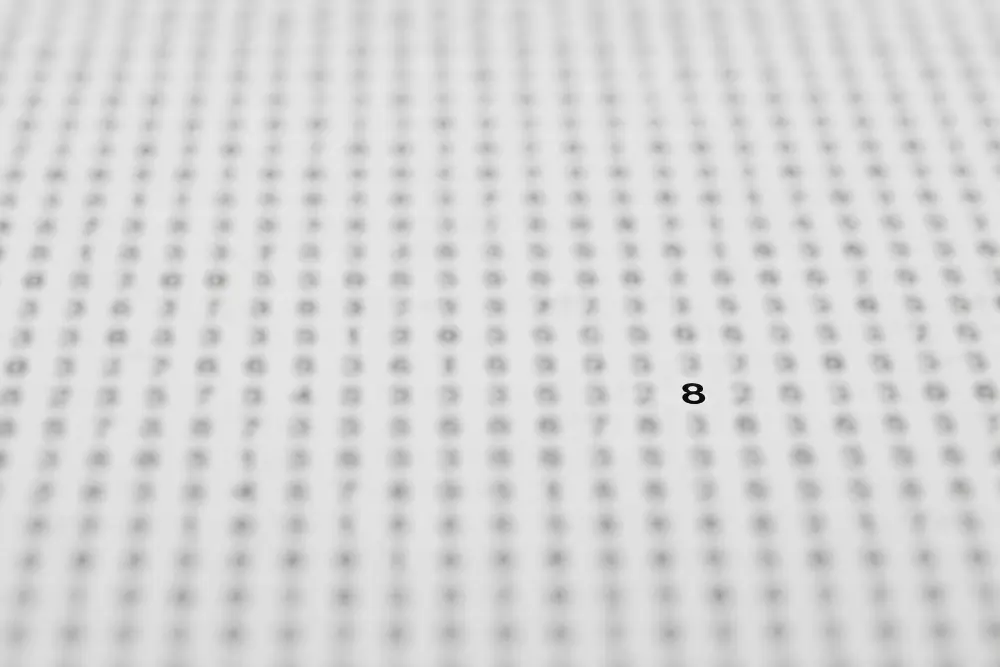 An image slowly showing loads of numbers slightly blurred with the number 8 sticking out clearly.